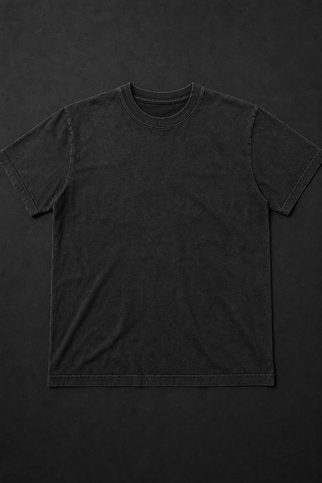 The same tee front facing up, with a small number printed at the left chest reading 037 of 100.